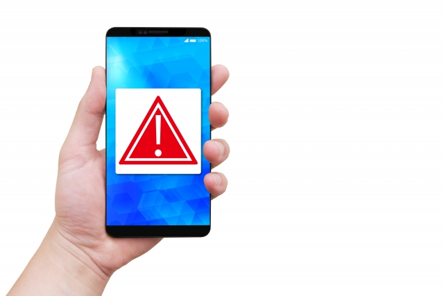 スマホに要注意マークが入った画像